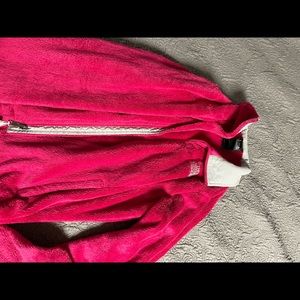 Pink North Face jacket.